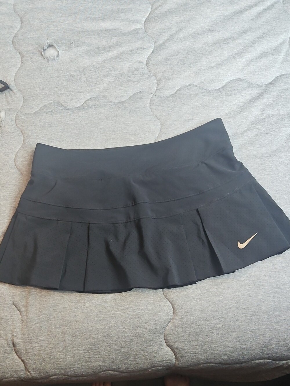 17. Nike Black Pleated Athletic Skort